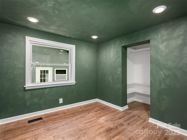 15 Burtiller Ln, Fletcher, NC 28732 - spare room featuring wood finished floors, baseboards, and recessed lighting