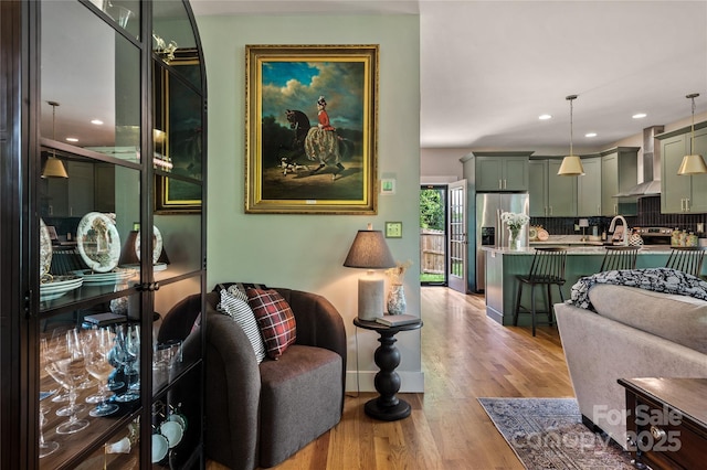 109 Druid Dr, Asheville, NC 28806 - living room featuring wood finished floors, recessed lighting, and baseboards