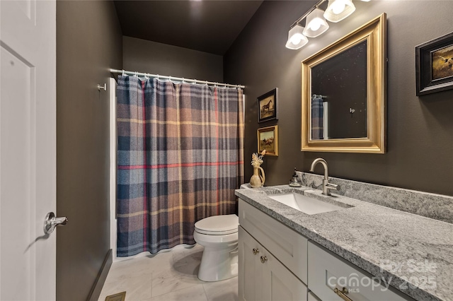109 Druid Dr, Asheville, NC 28806 - bathroom with vanity, toilet, marble finish flooring, and a shower with curtain