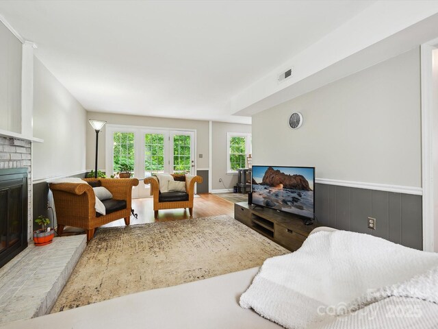7317 Red Branch Ln, Charlotte, NC 28226 - living area featuring wood finished floors and a fireplace