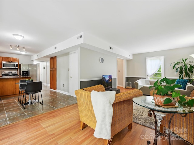 7317 Red Branch Ln, Charlotte, NC 28226 - living room featuring dark wood-style flooring