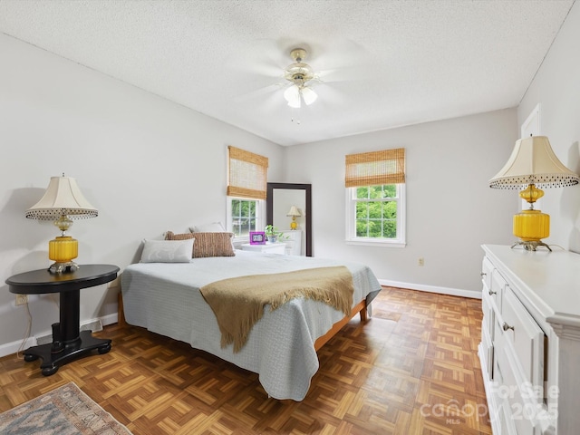 7317 Red Branch Ln, Charlotte, NC 28226 - bedroom featuring a textured ceiling, baseboards, and a ceiling fan