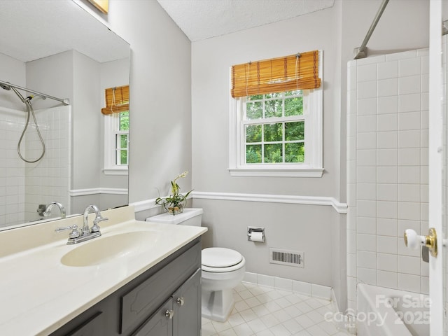 7317 Red Branch Ln, Charlotte, NC 28226 - full bath with vanity, toilet, healthy amount of natural light, tile patterned flooring, and a textured ceiling