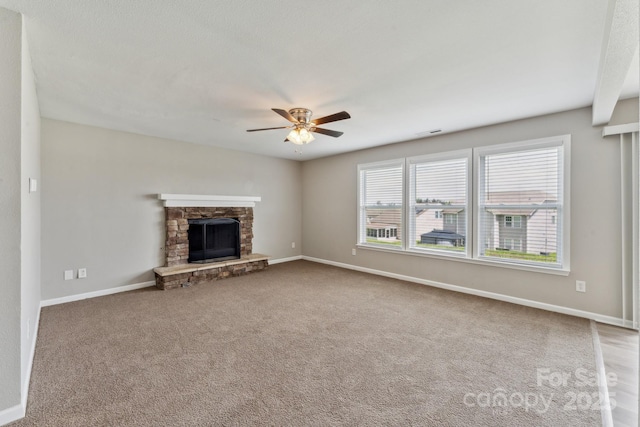 673 Shellbark Dr, Concord, NC 28025 - unfurnished living room featuring a ceiling fan, carpet flooring, and baseboards