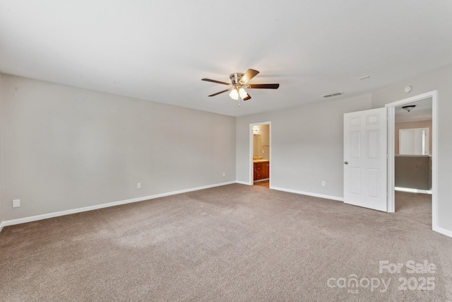673 Shellbark Dr, Concord, NC 28025 - unfurnished bedroom featuring carpet floors, baseboards, ensuite bathroom, and ceiling fan