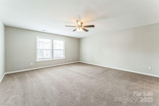 673 Shellbark Dr, Concord, NC 28025 - carpeted empty room featuring ceiling fan and baseboards