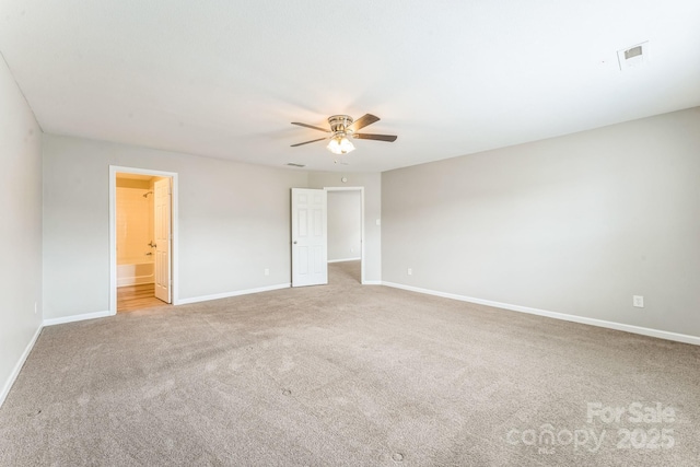673 Shellbark Dr, Concord, NC 28025 - unfurnished bedroom with carpet flooring, baseboards, and a walk in closet