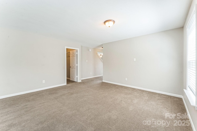 673 Shellbark Dr, Concord, NC 28025 - carpeted spare room with baseboards