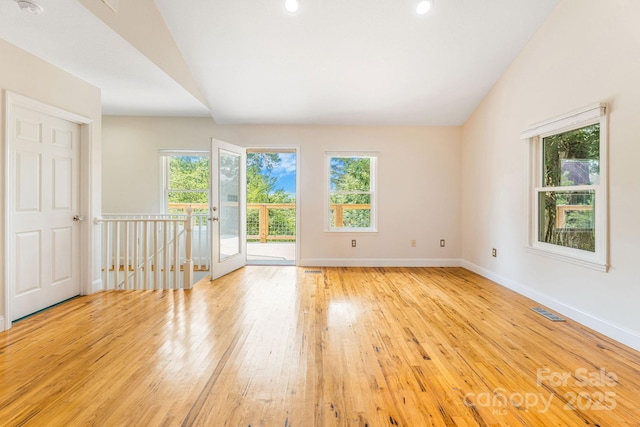 64 Mclain St, Asheville, NC 28803 - unfurnished room with light wood-style floors, baseboards, lofted ceiling, and recessed lighting