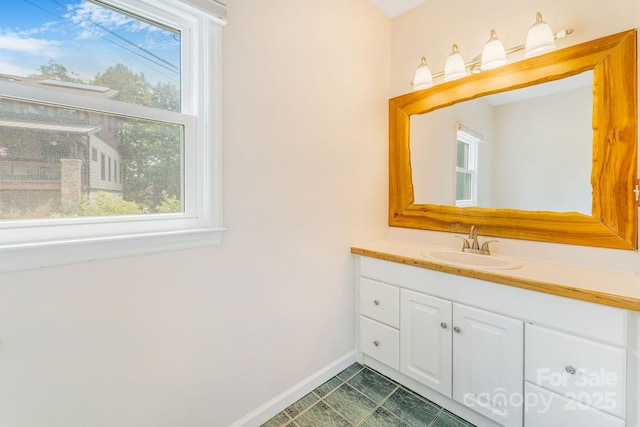 64 Mclain St, Asheville, NC 28803 - bathroom with vanity, tile patterned floors, and baseboards