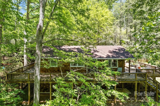 823 Turtle Creek Rd, Sylva, NC 28779 - rear view of property featuring a deck, stairs, roof with shingles, and a view of trees
