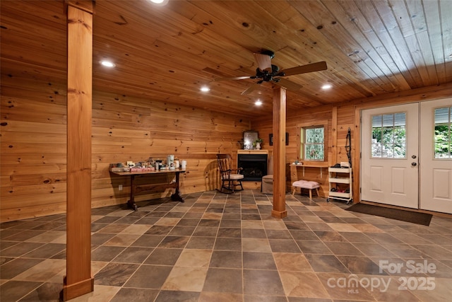 823 Turtle Creek Rd, Sylva, NC 28779 - home office featuring a fireplace, wooden ceiling, recessed lighting, a ceiling fan, and wood walls