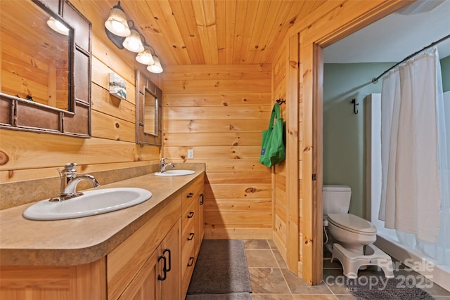 823 Turtle Creek Rd, Sylva, NC 28779 - bathroom with double vanity, wooden walls, wood ceiling, toilet, and shower / tub combo with curtain