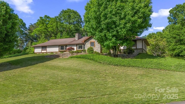 42 Grandview Ct, Franklin, NC 28734 - ranch-style home with stone siding, a chimney, and a front yard