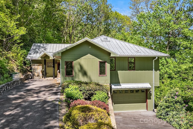 1760 Winding Creek Dr, Waynesville, NC 28786 - view of front of property with asphalt driveway, metal roof, a standing seam roof, and a garage