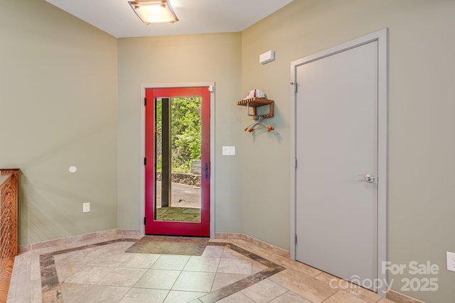 1760 Winding Creek Dr, Waynesville, NC 28786 - foyer entrance featuring inlaid floor details and baseboards