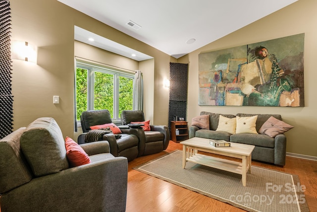 1760 Winding Creek Dr, Waynesville, NC 28786 - living area featuring wood finished floors and lofted ceiling