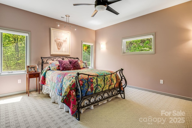 1760 Winding Creek Dr, Waynesville, NC 28786 - bedroom with baseboards, light colored carpet, and a ceiling fan