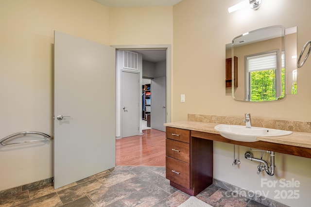 1760 Winding Creek Dr, Waynesville, NC 28786 - bathroom with vanity and stone finish floors