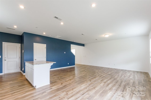 3073 Langhorne Ave SW, Concord, NC 28027 - unfurnished room with light wood-style flooring, baseboards, and recessed lighting