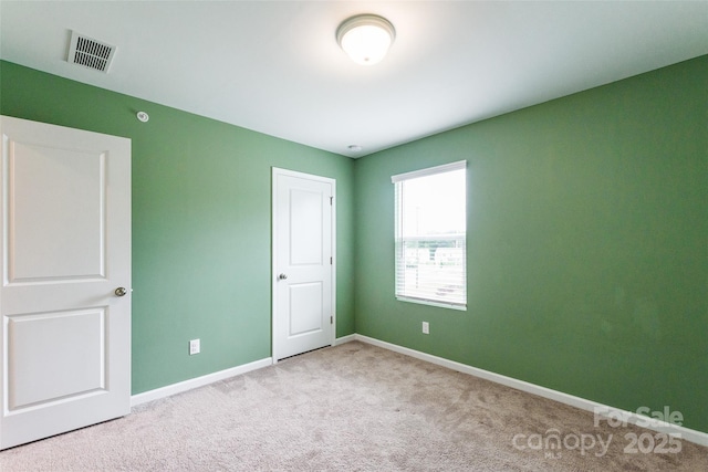3073 Langhorne Ave SW, Concord, NC 28027 - unfurnished bedroom featuring carpet and baseboards