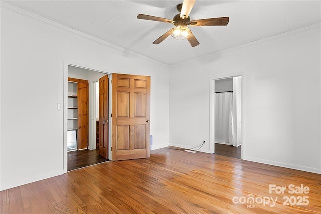 956 Stony Point Rd, Kings Mountain, NC 28086 - unfurnished bedroom with crown molding, wood finished floors, baseboards, and a ceiling fan