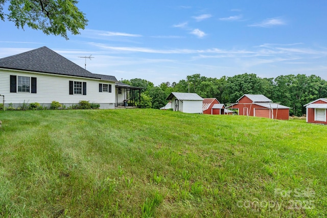 956 Stony Point Rd, Kings Mountain, NC 28086 - view of green lawn with a sunroom