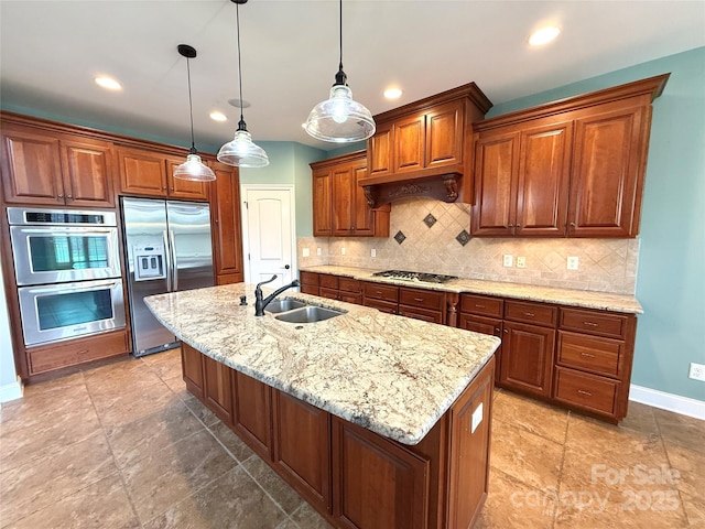 141 Weathers Creek Rd, Troutman, NC 28166 - kitchen with stainless steel appliances, backsplash, light stone counters, a center island with sink, and recessed lighting
