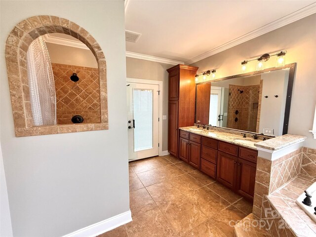 141 Weathers Creek Rd, Troutman, NC 28166 - full bath with a tile shower, crown molding, double vanity, a bath, and tile patterned flooring
