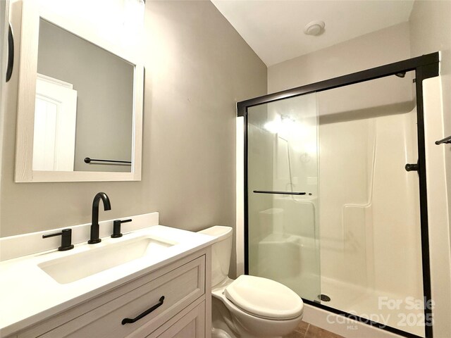 141 Weathers Creek Rd, Troutman, NC 28166 - bathroom featuring a shower stall and vanity