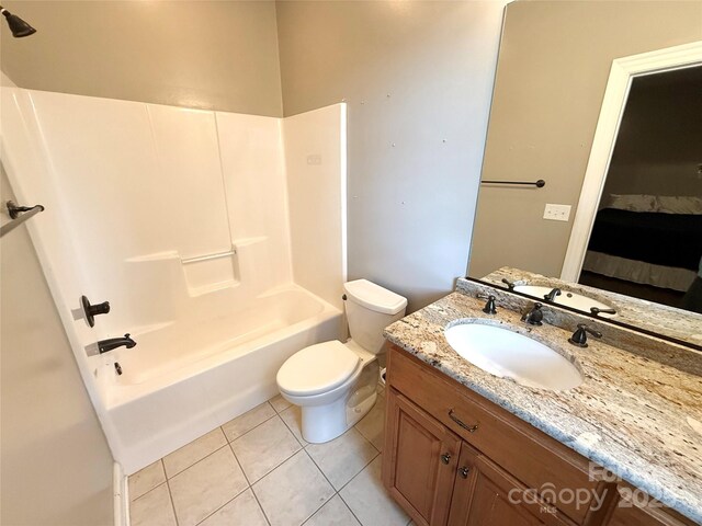 141 Weathers Creek Rd, Troutman, NC 28166 - ensuite bathroom with vanity, tile patterned floors, and shower / washtub combination