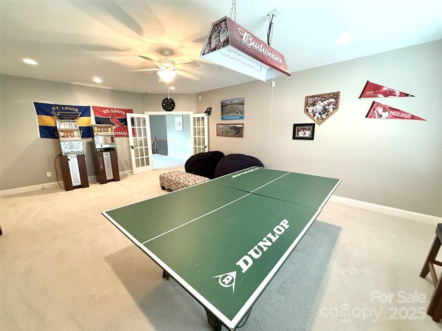 141 Weathers Creek Rd, Troutman, NC 28166 - rec room with french doors, carpet, ceiling fan, and recessed lighting