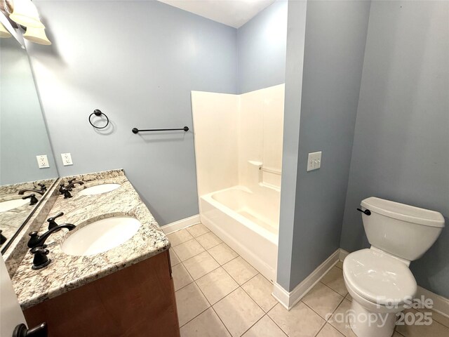 141 Weathers Creek Rd, Troutman, NC 28166 - full bathroom featuring double vanity, tile patterned floors, and shower / washtub combination