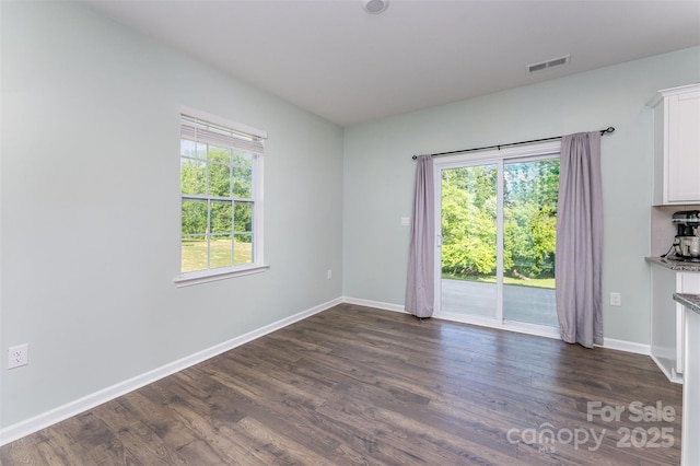 347 Carolina Hemlock Dr, Locust, NC 28097 - empty room featuring dark wood-style floors and baseboards