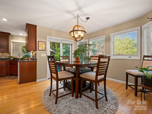 117 Eagles Crest Way, Lake Lure, NC 28746 - dining space featuring a chandelier, healthy amount of natural light, baseboards, and recessed lighting