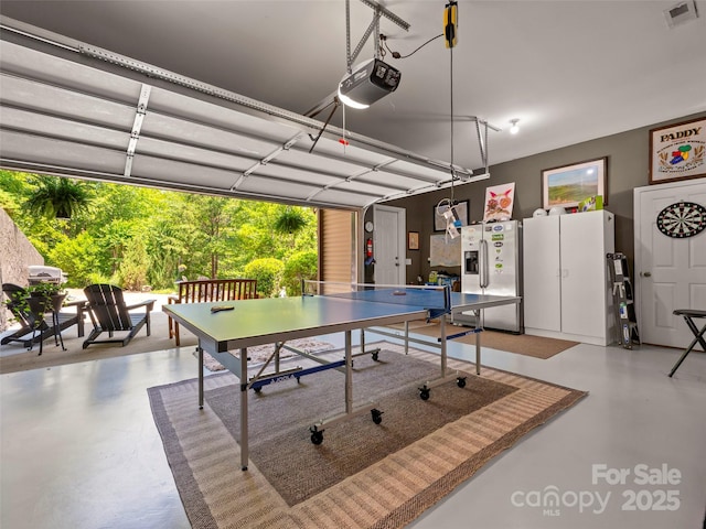 117 Eagles Crest Way, Lake Lure, NC 28746 - recreation room featuring concrete flooring and a garage
