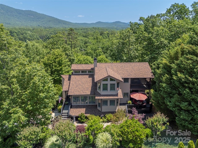 117 Eagles Crest Way, Lake Lure, NC 28746 - view of subject property featuring a heavily wooded area and a mountainous background