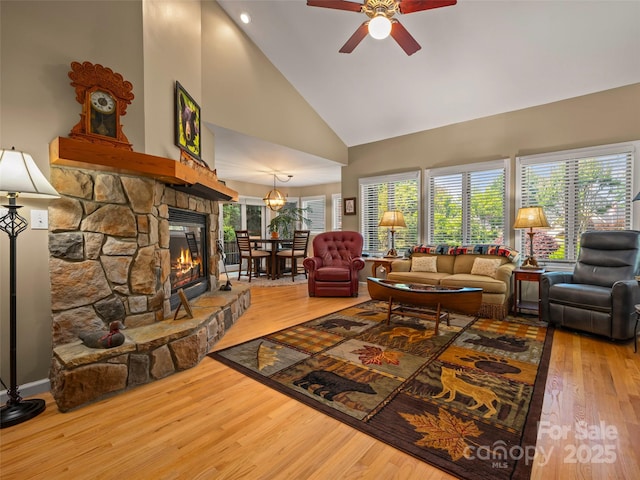 117 Eagles Crest Way, Lake Lure, NC 28746 - living area featuring high vaulted ceiling, wood finished floors, ceiling fan, and a fireplace