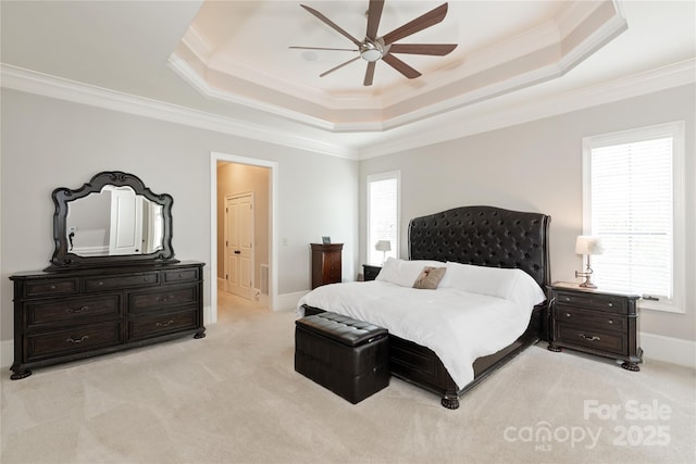 1032 Seminole Dr, Waxhaw, NC 28173 - bedroom with a raised ceiling, crown molding, light carpet, ceiling fan, and baseboards