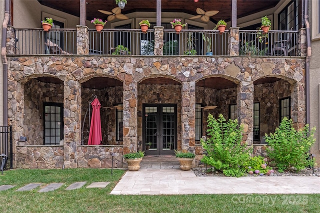 1032 Seminole Dr, Waxhaw, NC 28173 - doorway to property with french doors, ceiling fan, and stone siding