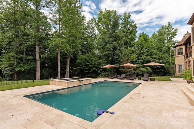 1032 Seminole Dr, Waxhaw, NC 28173 - view of pool featuring a patio area, a pool with connected hot tub, and view of wooded area