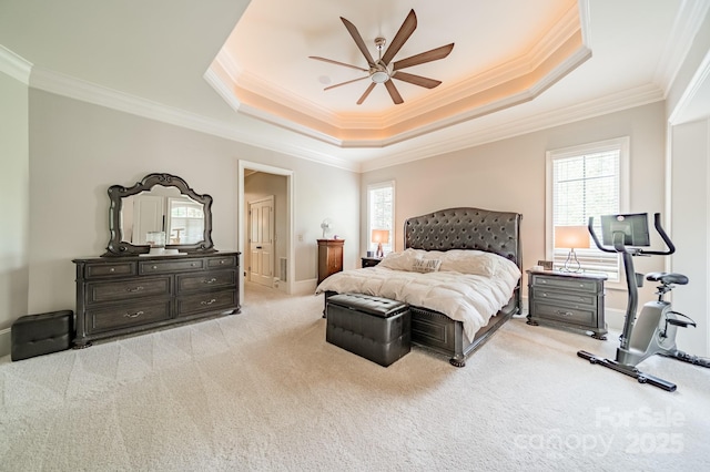 1032 Seminole Dr, Waxhaw, NC 28173 - bedroom with ornamental molding, light colored carpet, a raised ceiling, and a ceiling fan