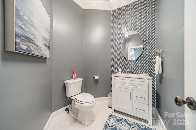1032 Seminole Dr, Waxhaw, NC 28173 - bathroom featuring marble finish floors, vanity, ornamental molding, and tile walls