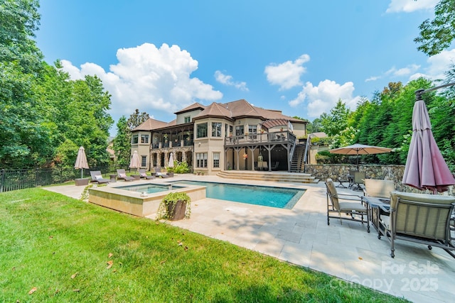 1032 Seminole Dr, Waxhaw, NC 28173 - view of swimming pool with an in-ground hot tub, stairway, a patio, and outdoor dining space