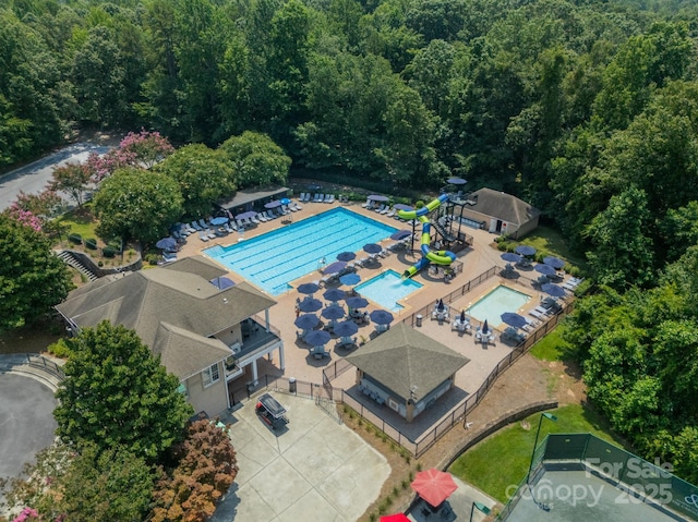1032 Seminole Dr, Waxhaw, NC 28173 - bird's eye view of a pool and a forest