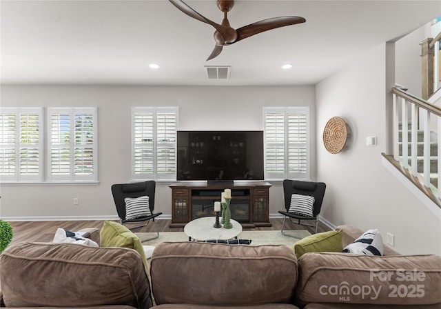 5481 Comiskey Aly, Kannapolis, NC 28081 - living area featuring stairs, a ceiling fan, plenty of natural light, baseboards, and recessed lighting