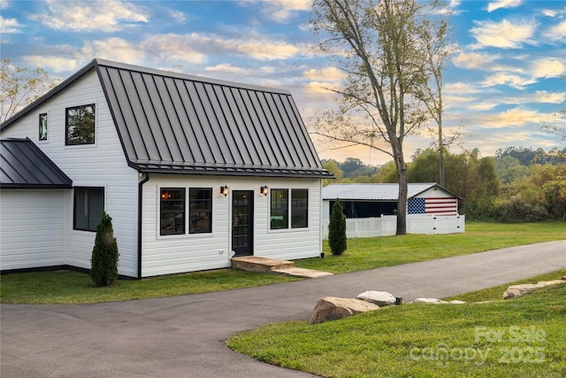 668 Old Hendersonville Hwy, Brevard, NC 28712 - view of front of house with a standing seam roof, metal roof, and a front yard