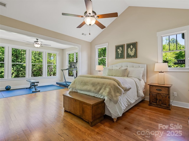 207 Hogans View Cir, Hendersonville, NC 28739 - bedroom featuring wood finished floors, high vaulted ceiling, and ceiling fan