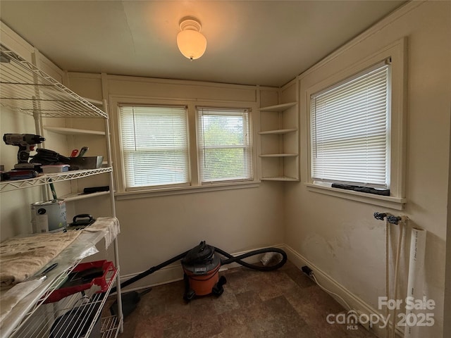 317 Heilig Ave, Salisbury, NC 28144 - laundry area with baseboards and stone finish flooring