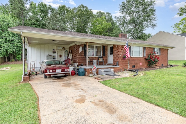 2210 Joes Lake Rd, Shelby, NC 28152 - single story home featuring a chimney, concrete driveway, an attached carport, a front yard, and brick siding
